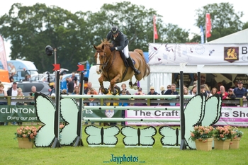 Timothy Davies takes the win in the International Stairway at the Devon County Show